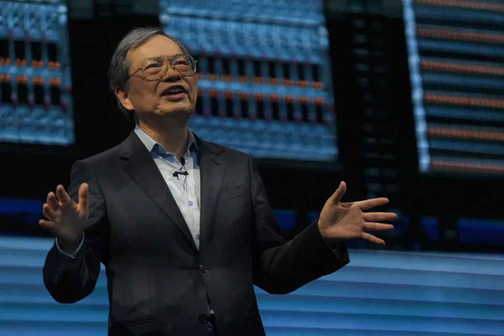 Charles Liang posing in front of Super Micro Computer products.